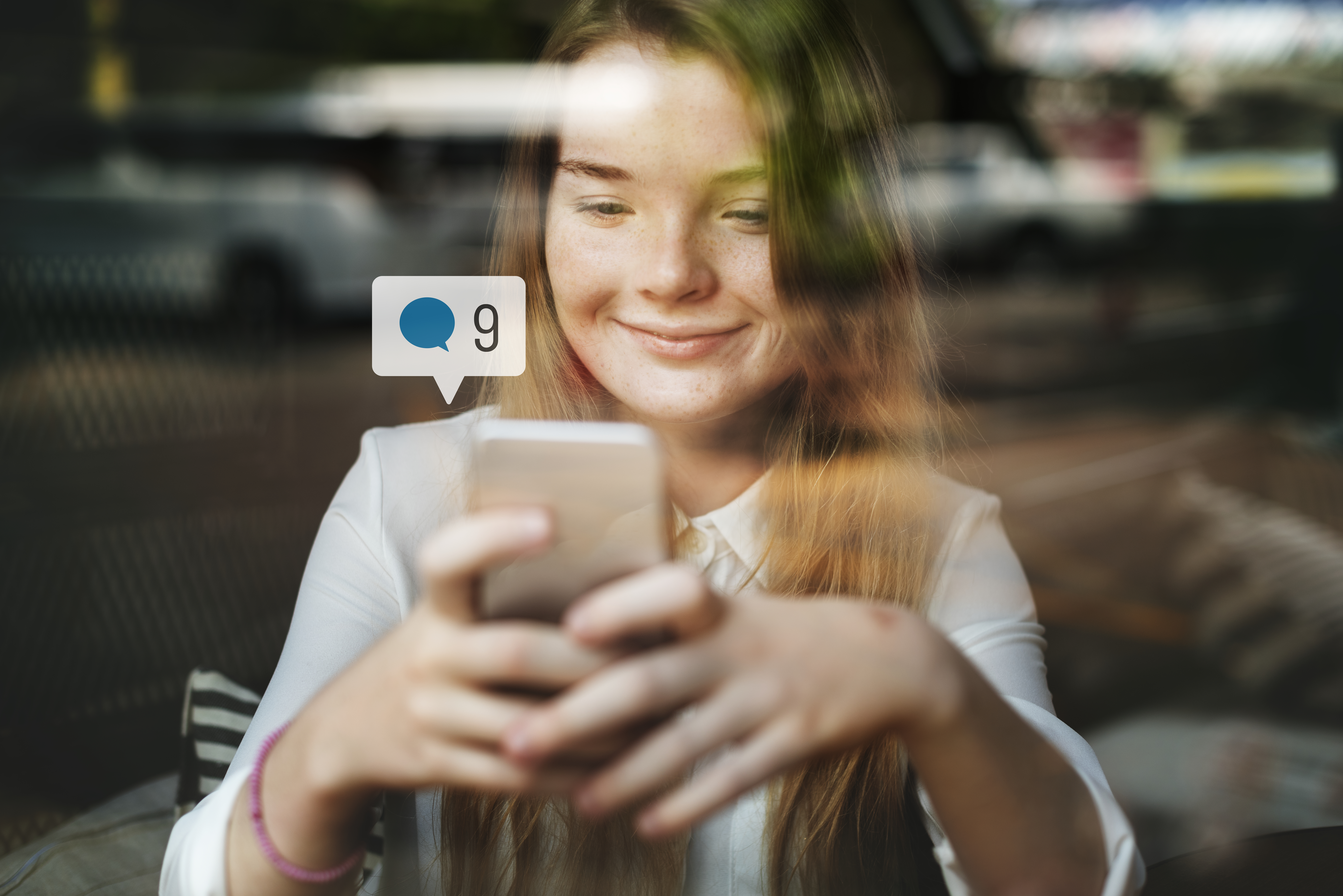 Happy woman using smartphone for mobile social media engagement and QR code scanning experiences
